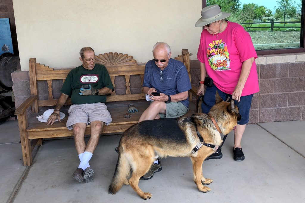 Howie, Bob, and Jacquie at the Farm & Ranch Museum resting after bed preparation 2019_07_29