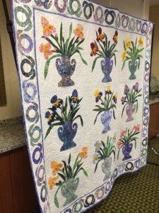 Raffles for a lovely iris quilt was sold at the 2016 regionals at Rio Rancho.  Various members of EVIS worked on this quilt.